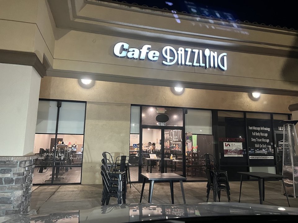 Modern dining tables in a small, low-key restaurant.