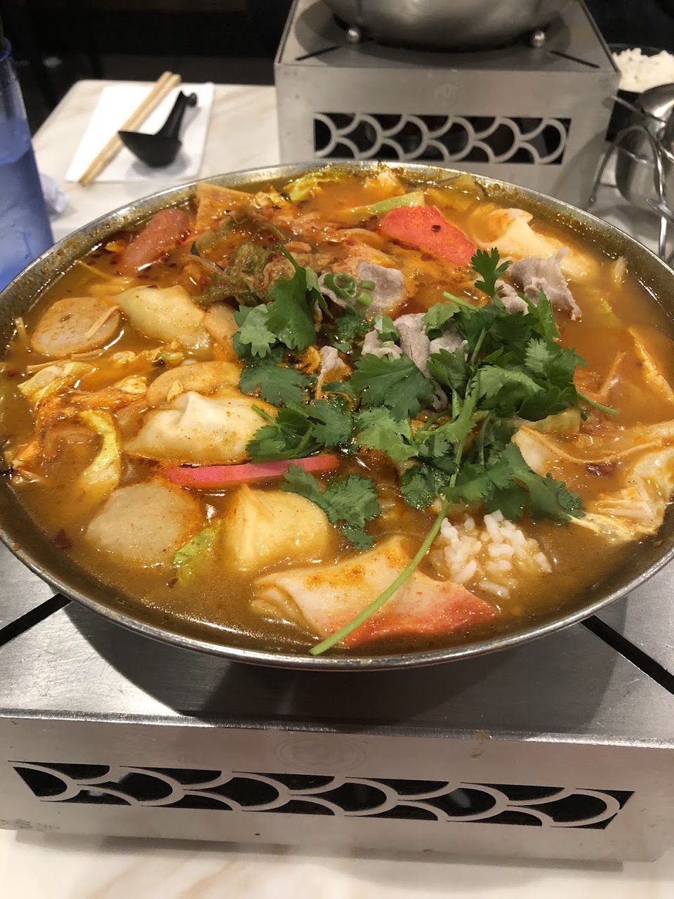 Ramen, soups, and smoothies listed on a menu.